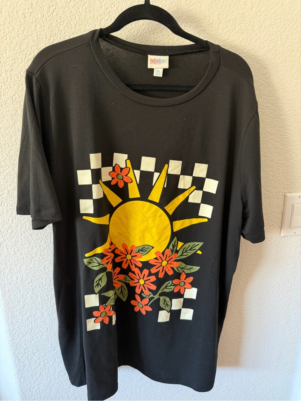 LuLaRoe Black Tee with Yellow Sun, Orange Flowers and White Checkerboard